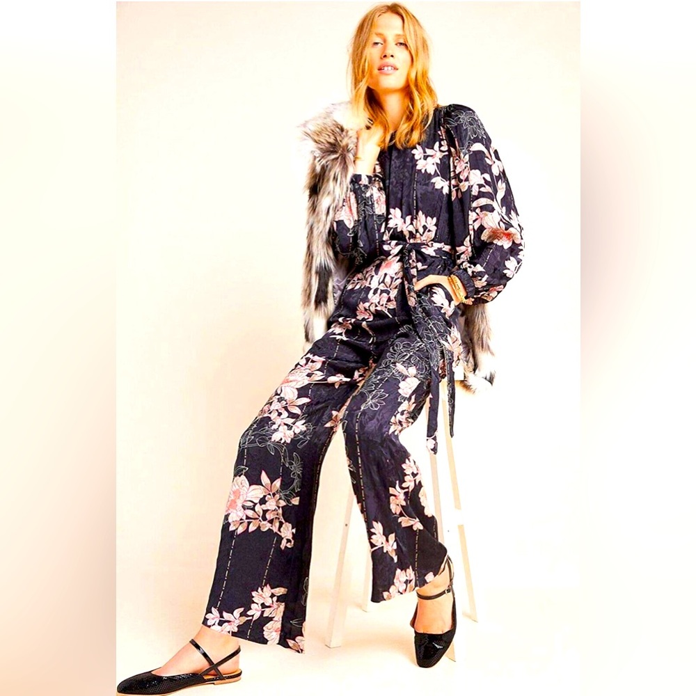 Never worn Anthropologie jumpsuit. Beautiful print!